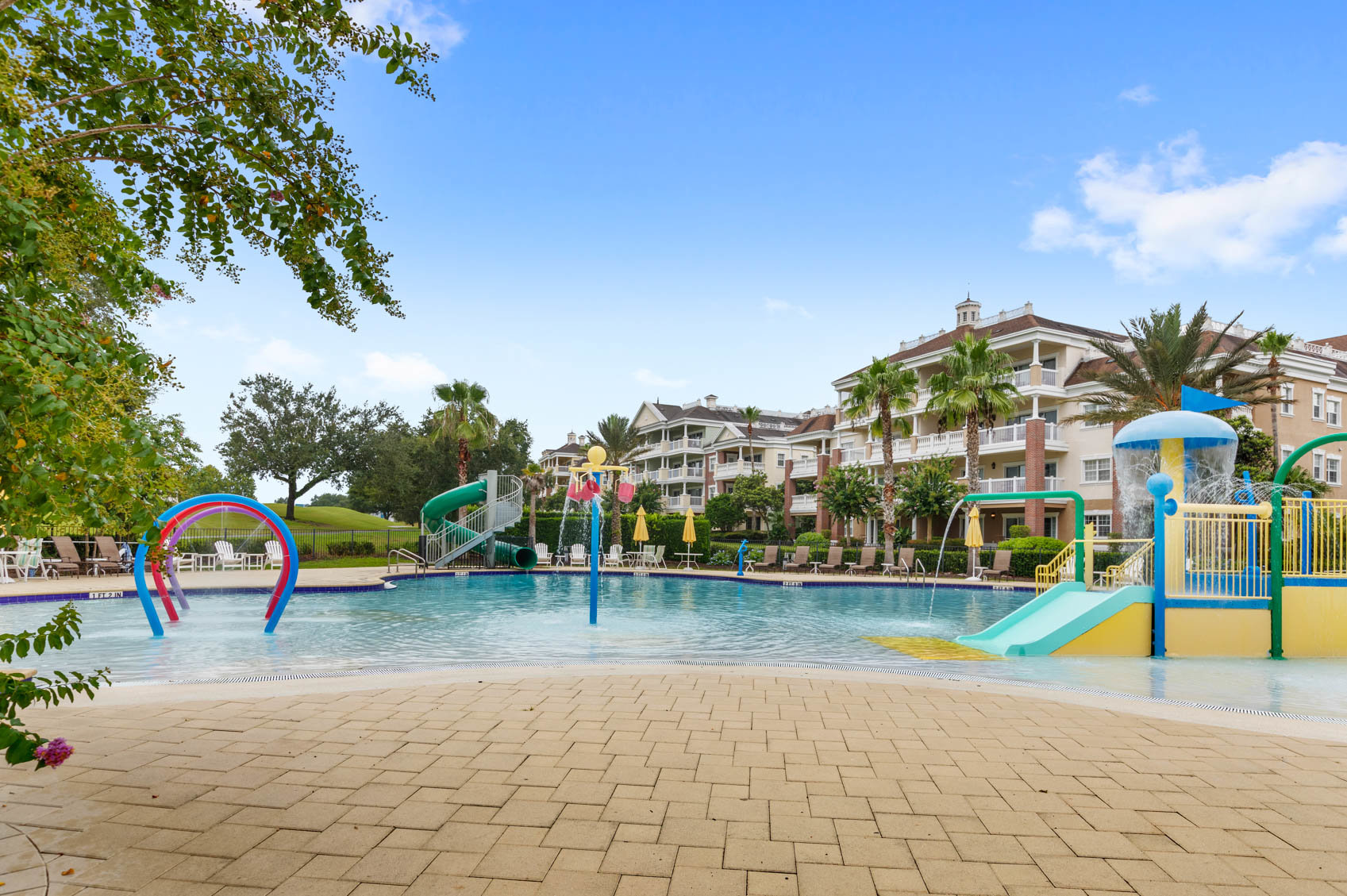 splash pad with condo building behind